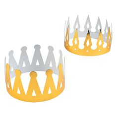 two yellow and silver crowns sitting next to each other