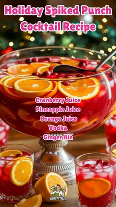 the holiday spiked punch cocktail recipe is served with orange slices and cranberry juice