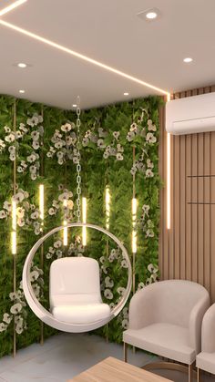 a living room filled with white furniture and greenery on the wall behind it is a swing chair