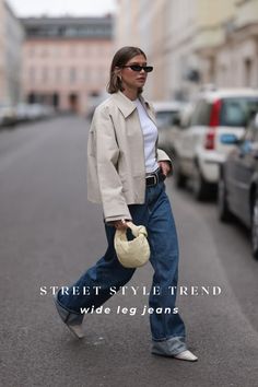 Wide-leg jeans outfits have been a fixture in Paris Fashion Week street style for years. The style set was snapped sporting wide-leg jeans with boots, leather jackets, knit sweaters, and so much more. Wide-leg jeans will continue to be a pivotal 2025 fashion trends to keep an eye on. Are you looking for new fall fashion inspo outfits? Check out these chic wide-leg jeans outfits from Paris Fashion Week 2024. Photo: Jeremy Moeller/Getty Images Wide Leg Jeans For Fall, Jeans With Boots, Paris Fashion Week 2024, Jeans For Fall, Fashion Week 2024