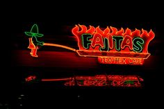 a neon sign that reads fatas texex cafe