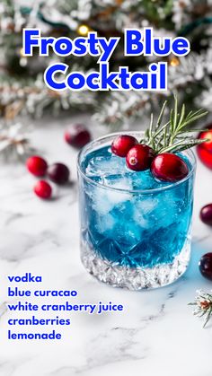 frosty blue cocktail with cranberries and rosemary