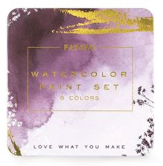 a purple and gold watercolor paint set with the words love what you make on it