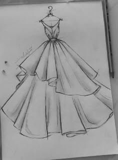 a drawing of a dress on a piece of paper