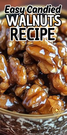 a bowl filled with caramelized walnuts on top of a wooden table and the words easy candied walnuts recipe above it