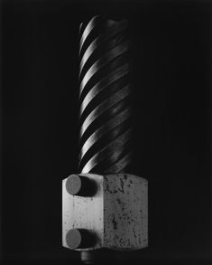 a black and white photo of a sculpture