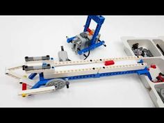 a lego airplane is shown with parts in it