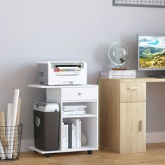 a computer desk with a printer on it