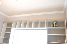 an empty room with shelves and tools in it