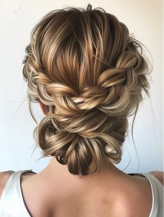 Elegant and Versatile Braided Bun Hairstyles Braid Hairstyles For Bridesmaids, Braid And Bun Updo, Wedding Hairstyles Low Bun Messy, Braid Styles Wedding, Junior Bridesmaids Hairstyles, Braid Updos For Long Hair, Hoco Hairstyles Bun, Low Bun Prom Hairstyles With Braid, Wedding Low Bun With Braid