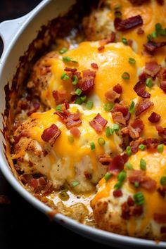 a casserole dish with chicken, cheese and bacon