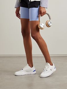 Inspired by tennis styles, ON's 'The Roger Spin' sneakers are designed with the demands of professional athletes in mind. They're made from breathable mesh trimmed with rubber and have comfortable CloudTec® cushioning and the signature Speedboard® to propel you forward faster. Brand Session, Denim Flats, Eyewear Shop, Mesh Sneakers, Sport Swimwear, Sports Skirts, Jo Malone London, White Mesh, Party Looks