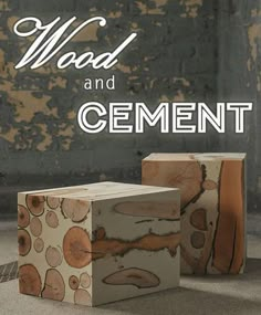 two wooden blocks sitting next to each other in front of a wall with the words wood and cement on it