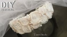 the bridal garter is adorned with flowers and pearls