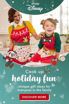 an advertisement for the disney store with two girls in aprons and mickey mouse outfits