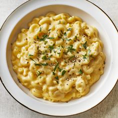 a white bowl filled with macaroni and cheese