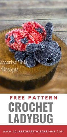 a crochet ladybug sitting on top of a piece of wood with the words free pattern