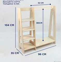 the measurements of a wooden shelf with shelves and ladders on each side for storage