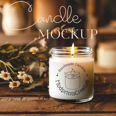 a candle sitting on top of a wooden table