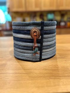 a close up of a bracelet on a table