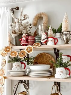 a shelf filled with christmas decorations and plates