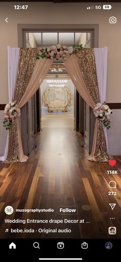 an image of a wedding entrance with flowers on the front door and in the back