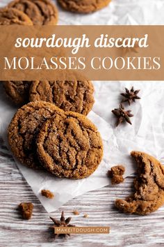 a close up of some cookies on a table with cinnamons and anise sprinkled