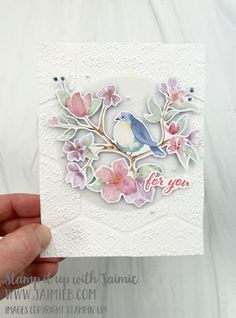 someone is holding up a card with flowers and a blue bird on it, which reads for you