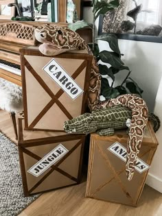 cardboard boxes are stacked on top of each other in front of a piano