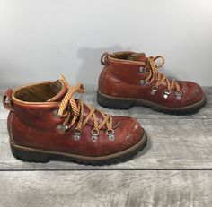 "Up on ETSY for buy it now is a pair of good condition, Vintage Wood N Stream Hiking Leather Women's Hiker Hiking Stomper Boots. Made in USA. Size 7.5 M, medium. Leather uppers. Rubber soles. From smoke-free home. Clean inside and out. Very well built and sturdy. Approximate Outside Dimensions: 11.25 inches heel to toe by 4 inches across the ball of footwear by 1.25 inches tall heels by 5.5 inches tall.  Sold as is gently used.  Please check out the pictures. If you need more pictures or information regarding the item, please send them to me. Please keep in mind that all of my items are vintage, gently used, unless otherwise indicated in the listing. Like what see out of my listings, check us out and \"Like\" us on Facebook under \"Tyjahn\" for pics of our NEWEST picks. Thanks for supporti Vintage Lace-up Boots For Outdoor Activities, Vintage Leather Boots For Outdoor Activities, Vintage Ankle Combat Boots For Outdoor, Vintage Brown Lace-up Boots For Outdoor, Vintage Waterproof Boots With Vibram Sole For Outdoor, Vintage Hiking Boots With Vibram Sole, Vintage Hiking Boots With Round Toe For Adventure, Vintage Style Hiking Boots With Round Toe, Vintage Leather Hiking Boots For Walking