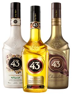 three bottles of alcohol sitting next to each other on a white surface with the number 45