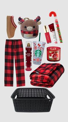 the contents of a christmas gift set including plaid pants, socks and other holiday items