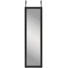 a tall mirror hanging on the side of a wall next to a black frame and metal bar