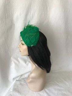 Perfect time for Wedding look, This is a classy vintage inspired 1950s - 1960s Green half hat with a modern touch perfect as a bridal fascinator hat, wedding hat, tea party hat, church hat or any other special occasion. This is a green felt headpiece create by hand and has a wire base that can fit any head size comfortably. WHAT MAKES THIS SO UNIQUE I form each piece while on my head to see how it fits and looks and then take it off and hand sew each piece. I design it to wear both ways so there Vintage Headband Costume Hat For Party, Vintage Costume Headband For Party, Vintage Adjustable Fascinator Headband, Vintage Mini Hat Headband For Parties, Vintage Adjustable Headband For Evening, Flapper Hat Headpiece For Party, Vintage Fitted Headpieces For Party, Flapper Party Hat Headpiece, Retro Adjustable Headpieces For Wedding