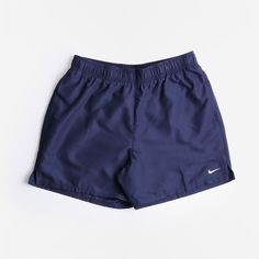 The Nike Swim Core Solid 5" Shorts in Midnight Navy are a lightweight, mesh lined swim short style. Built from 100% polyester mechanical stretch twill that's durable, comfortable and sheds water. The polyester twill fabric gives these shorts more of a chino look making them perfect for everyday wear in the heat of Summer. The trunk's waistband is crafted with elastic stretch and a drawcord for a secure fit. They also feature a built-in mesh brief for support, mesh side pockets and an internal me Casual Beach Outfit, Embroidered Nike, Swimming Shorts, Nike Swim, Clean Aesthetic, Swim Short, Swoosh Logo, Nike Swoosh, Midnight Navy