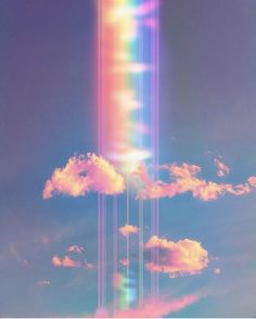 the sky is filled with colorful clouds and rainbow colored lines that are all over it