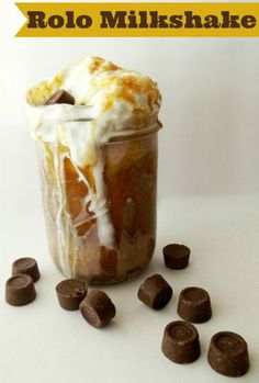 a jar filled with chocolate chips and marshmallows