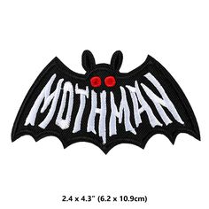 a bat with the word batman on it's back and red eyes in white letters