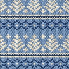 a blue and white knitted pattern with hearts