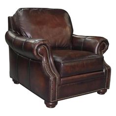 a brown leather chair with studding on the armrests and foot rests against a white background