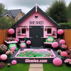 a pink and black shed with frog decorations