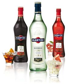 several different types of alcohol bottles are shown in this advertisement for martini vodka, which is the most popular beverage in america