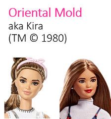 the doll is wearing a white dress and has long hair with braids on her head