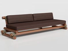 a brown couch sitting on top of a wooden frame