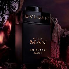 A contrasted, textured scent composition crafted with layers of refined olfactive elegance and sophisticated sensorial luxury. The BVLGARI Man in Black Parfum celebrates all things mythical and mystical, honouring the power of fire with its charismatic amber-woody fragrance.  Reimagining the original Man in Black cologne, the parfum opens with smoked spice nuances and resinous elemi essence, before being set alight with lavish florals to impart a unique freshness. Burning in the base, notes of b Bvlgari Man In Black, Bvlgari Man, Estee Lauder Nutritious, Dark Woods, Man In Black, Grande Cosmetics, First Aid Beauty, Woody Fragrance, Floral Heart