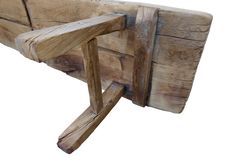 a wooden bench made out of wood planks