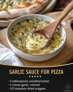 a bowl of garlic sauce for pizza on a cutting board