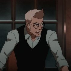 an animated image of a man with glasses sitting at a desk in front of a window