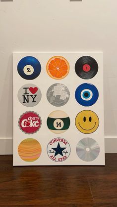 an art piece with various stickers on it