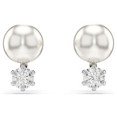 These stunning pierced studs are a fresh take on the classic pearl earring. Each rhodium plated piece features a single white Swarovski Crystal Pearl and a round-cut Swarovski Zirconia, linked in a refined display of light-filled luxury. Pair with a matching Matrix pendant for added radiance. Classic Pearl Earrings, Crystal Stud Earrings, Swarovski Earrings, Pearl Stud Earrings, Crystal Pearls, Metal Bracelets, Pearl Studs, Silver Pearls, Matrix